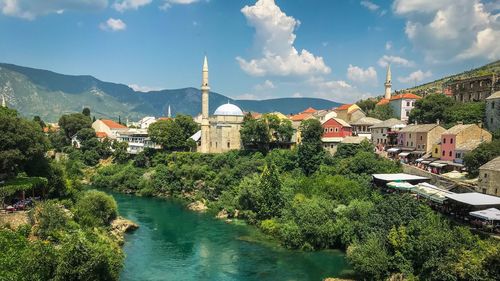 Panoramic view of river amidst buildings against the sky. a very nice place of herzagovina bosnia