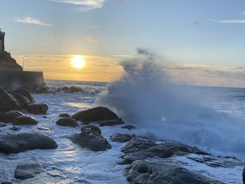 Scenic view of sea against sky during sunset