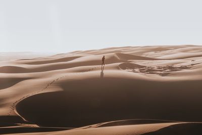 Person on sand dune