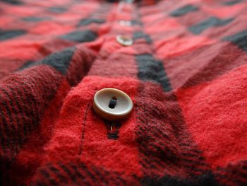 Close-up of buttons on fabric
