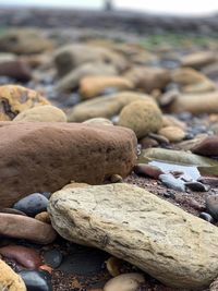 Close-up of stones on shore