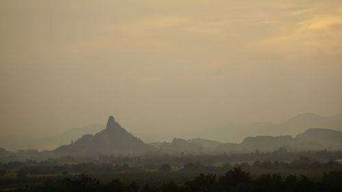 Scenic view of landscape against sky during sunset