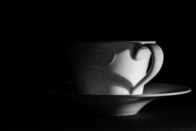 Close-up of empty coffee cup on table