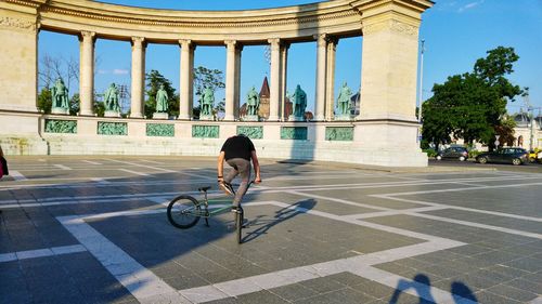 Man performing bicycle stunt