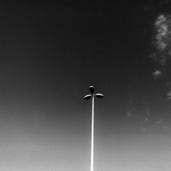 Low angle view of bird against sky