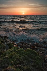 Scenic view of sea against sky during sunset