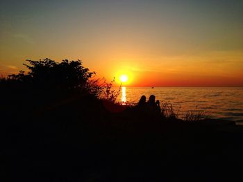 Scenic view of sea at sunset