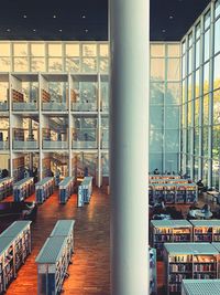 Empty chairs and table in building
