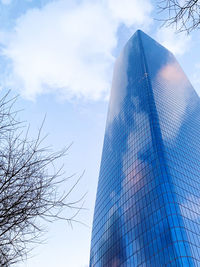 Low angle view of modern building against sky