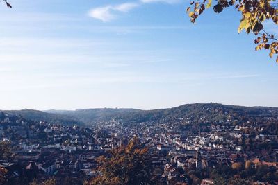 Cityscape with mountain range in background