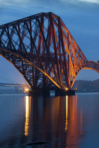 View of bridge over river in city