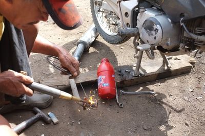 Man working on motorcycle