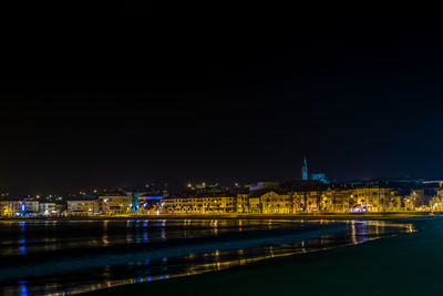 Panoramic night view of the town of panxon. small tourist town of the rias baixas