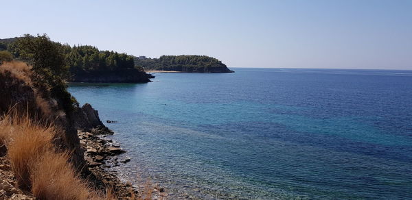 Scenic view of sea against clear sky