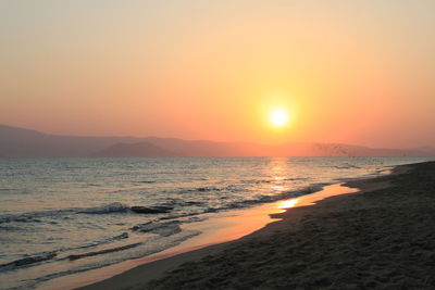 Scenic view of beach during sunset