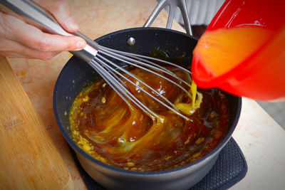 High angle view of person preparing food in kitchen
