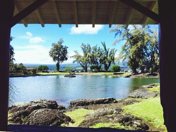 Scenic view of lake against blue sky