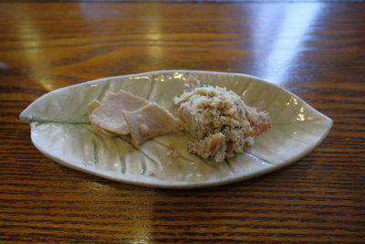 Close-up of serving food in plate