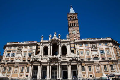 Low angle view of building against blue sky