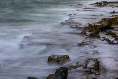 Waves splashing on rocks