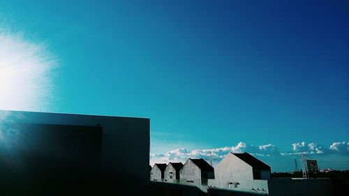 Houses against blue sky