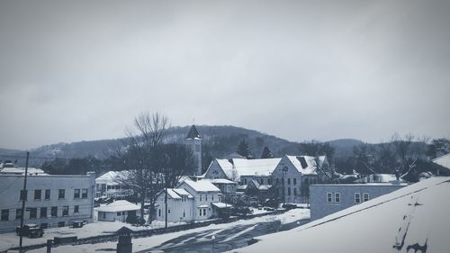 High angle view of houses in town during winter