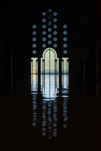 Interior of illuminated building at night