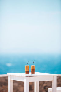 Built structure on beach against sky