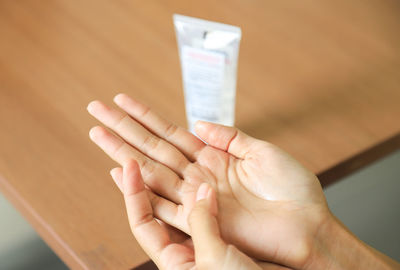 Close-up of woman holding hands