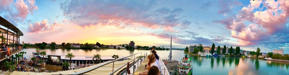 Panoramic view of river against sky during sunset