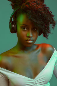 Close-up of woman wearing headphones