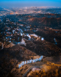 High angle view of illuminated buildings in city