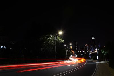 Light trails on road at night