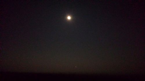 Low angle view of moon in sky