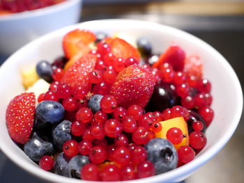 High angle view of strawberries in bowl on table