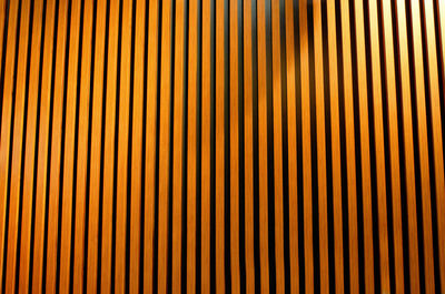 Wooden slats on wall in modern interior. abstract background. wooden wall.