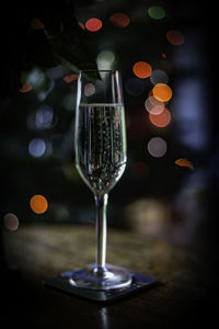 Close-up of wine bottles on table