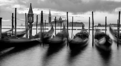 View of boats moored in water