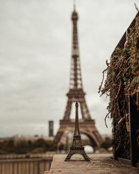 Ferris wheel in city against sky