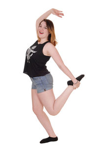 Portrait of smiling young woman against white background