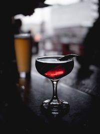 Close-up of wineglass on table