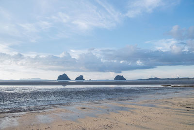 Scenic view of beach against sky