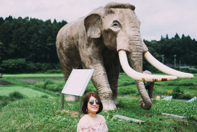 Full length of girl on field