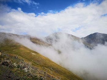 Scenic view of mountains during foggy weather