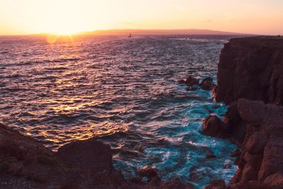 Scenic view of sea against sky during sunset