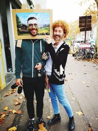 Portrait of friends standing outdoors