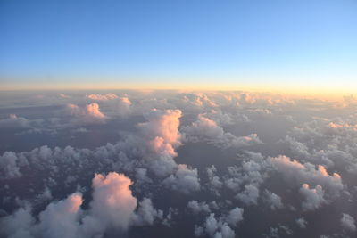 Aerial view of cloudscape against sky during sunset