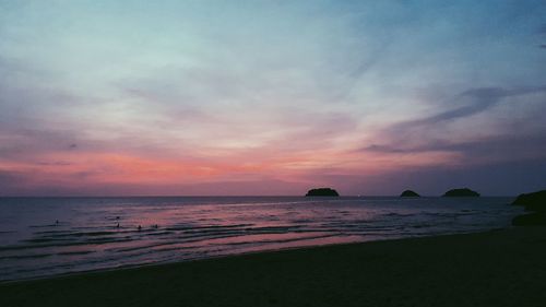 Scenic view of sea against dramatic sky