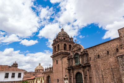 Church of the society of jesus against sky at plaza de armas