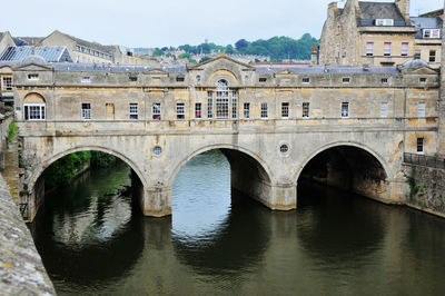 Photo of an ancient stone bridge in bath, england